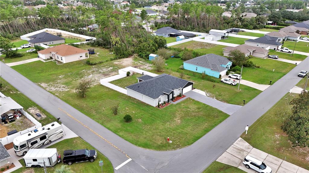 10648 Southwest 38th Avenue Ocala, FL 34476 - Photo 49 of 52 an aerial view of a house with a garden