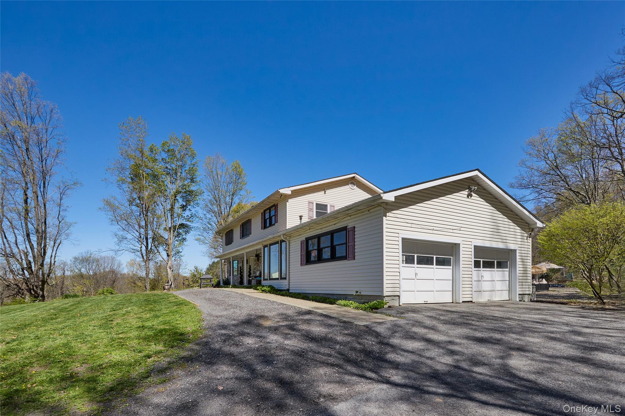 32 Cole Road Pleasant Valley, NY 12569 - Photo 13 of 49 a front view of a house with a garden