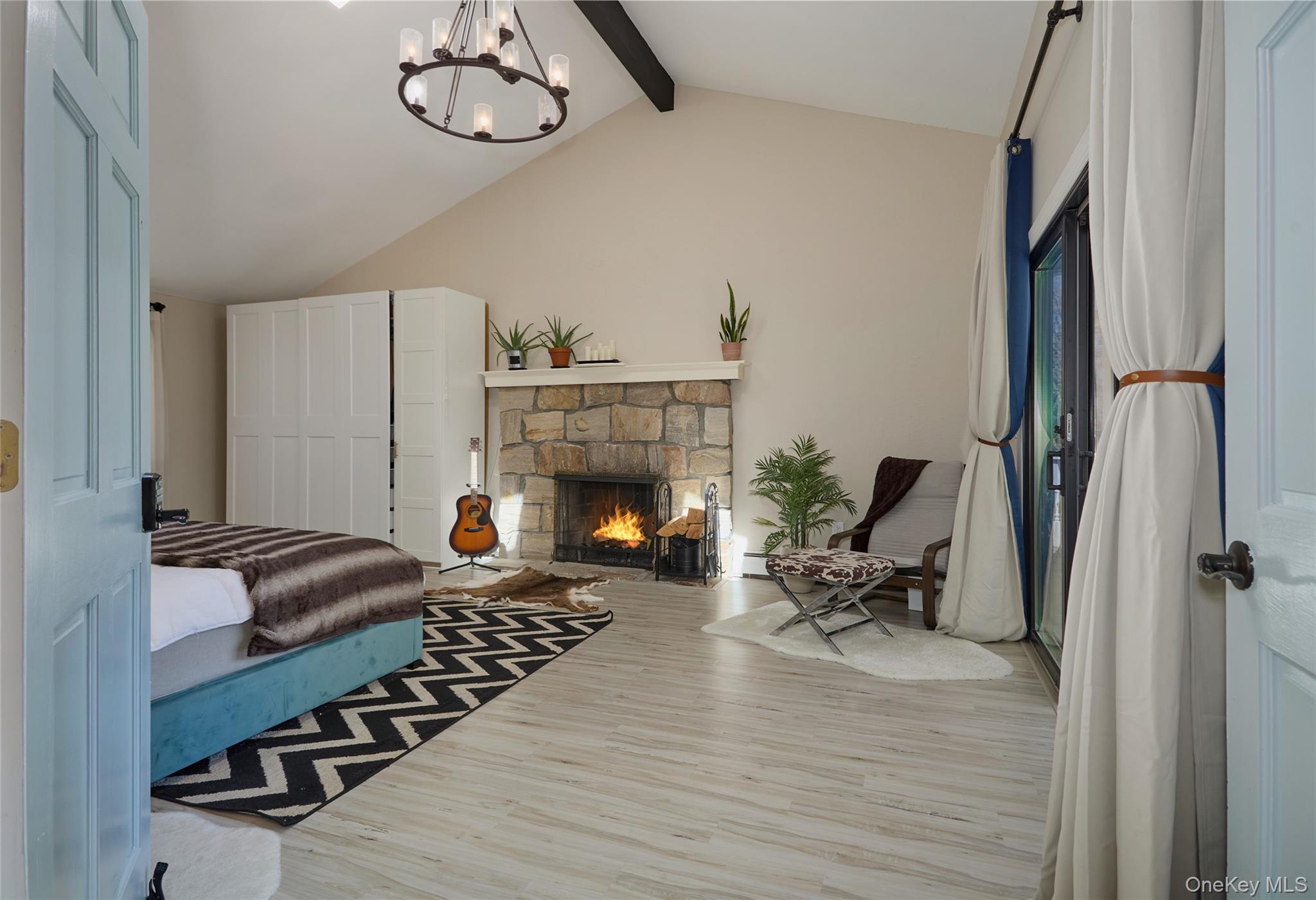 32 Cole Road Pleasant Valley, NY 12569 - Photo 24 of 49 a living room with furniture a fireplace and wooden floor