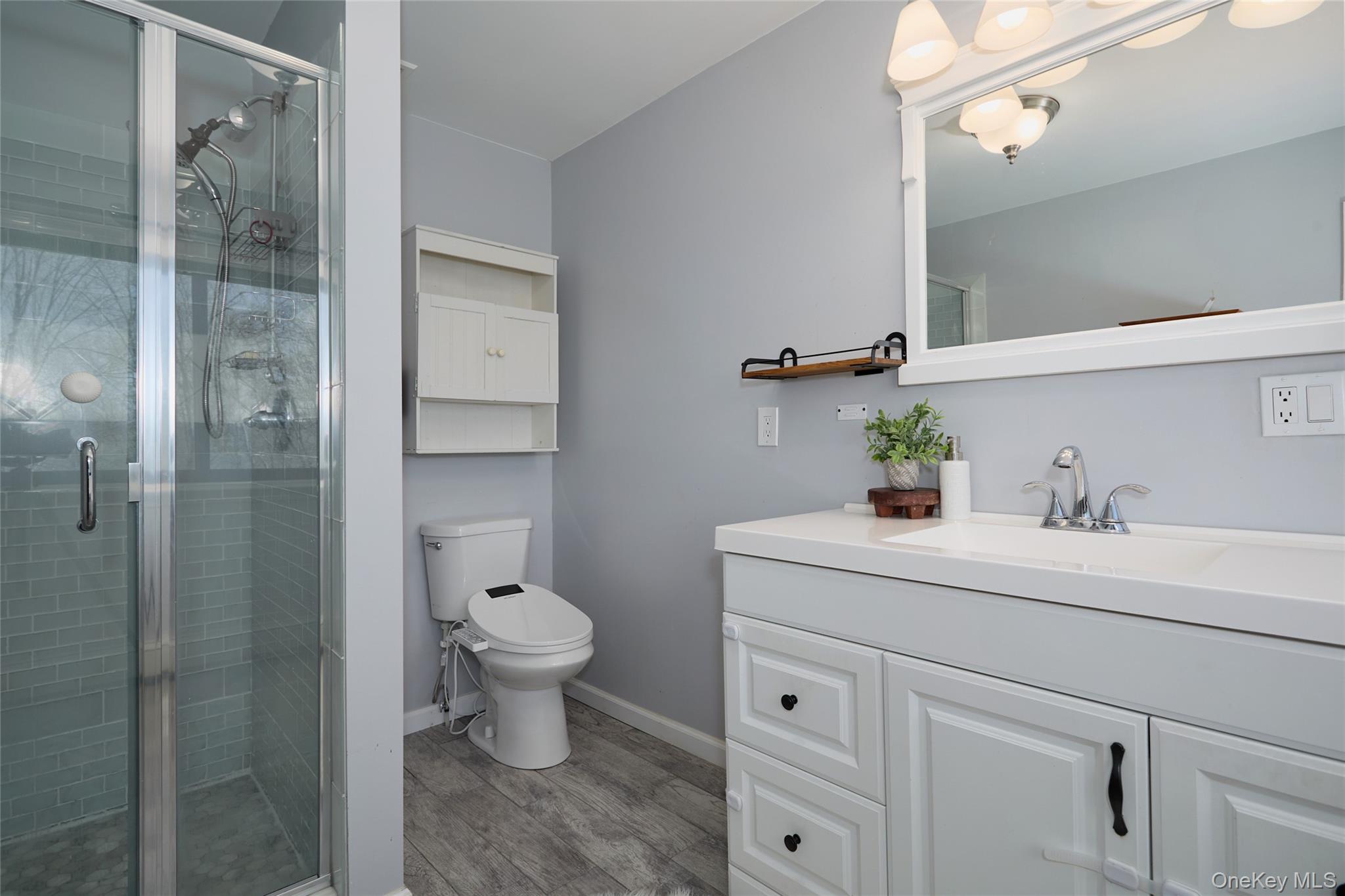 32 Cole Road Pleasant Valley, NY 12569 - Photo 31 of 49 a bathroom with a sink a toilet and shower