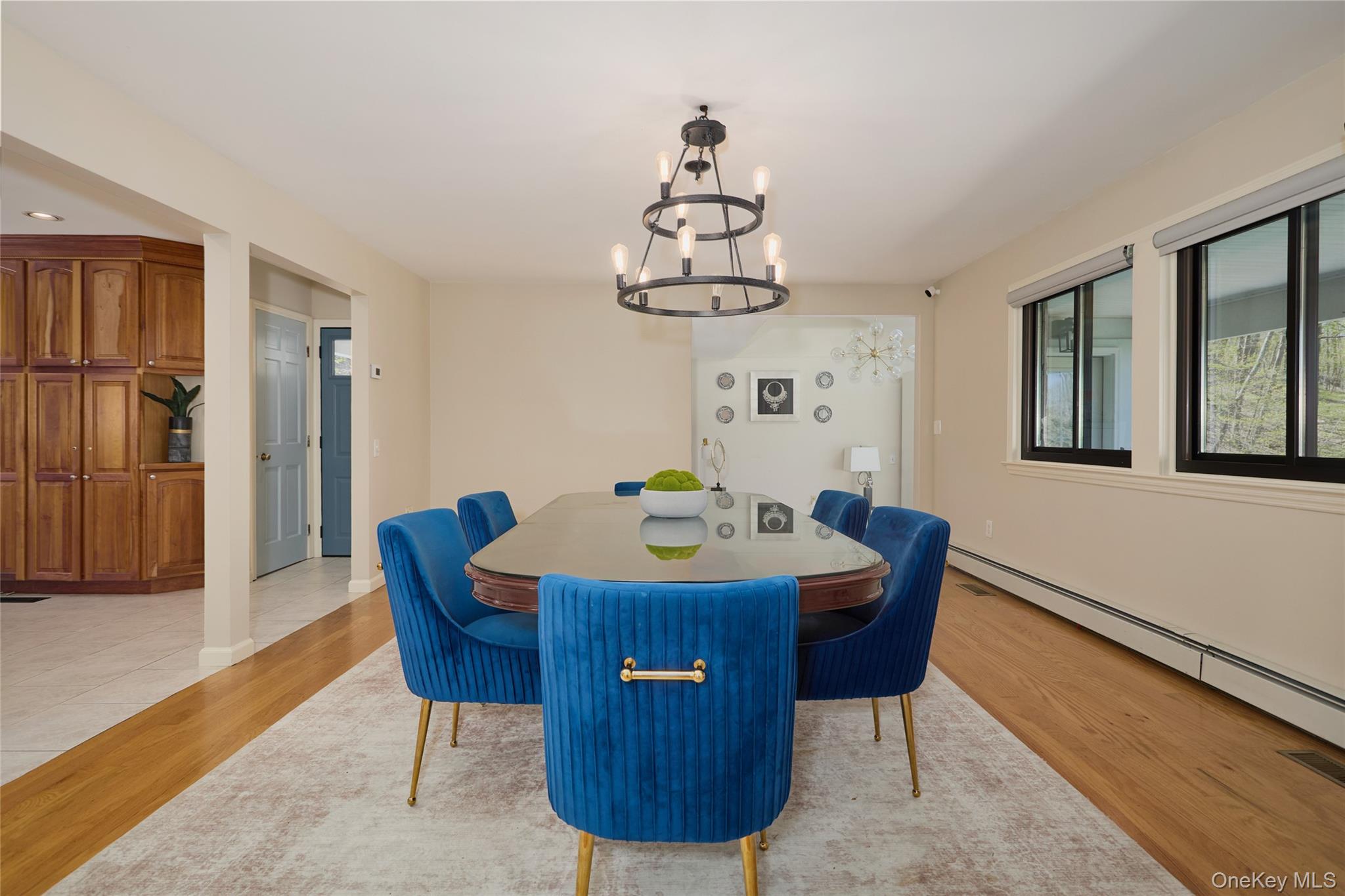 32 Cole Road Pleasant Valley, NY 12569 - Photo 34 of 49 a dining room with furniture a chandelier and wooden floor