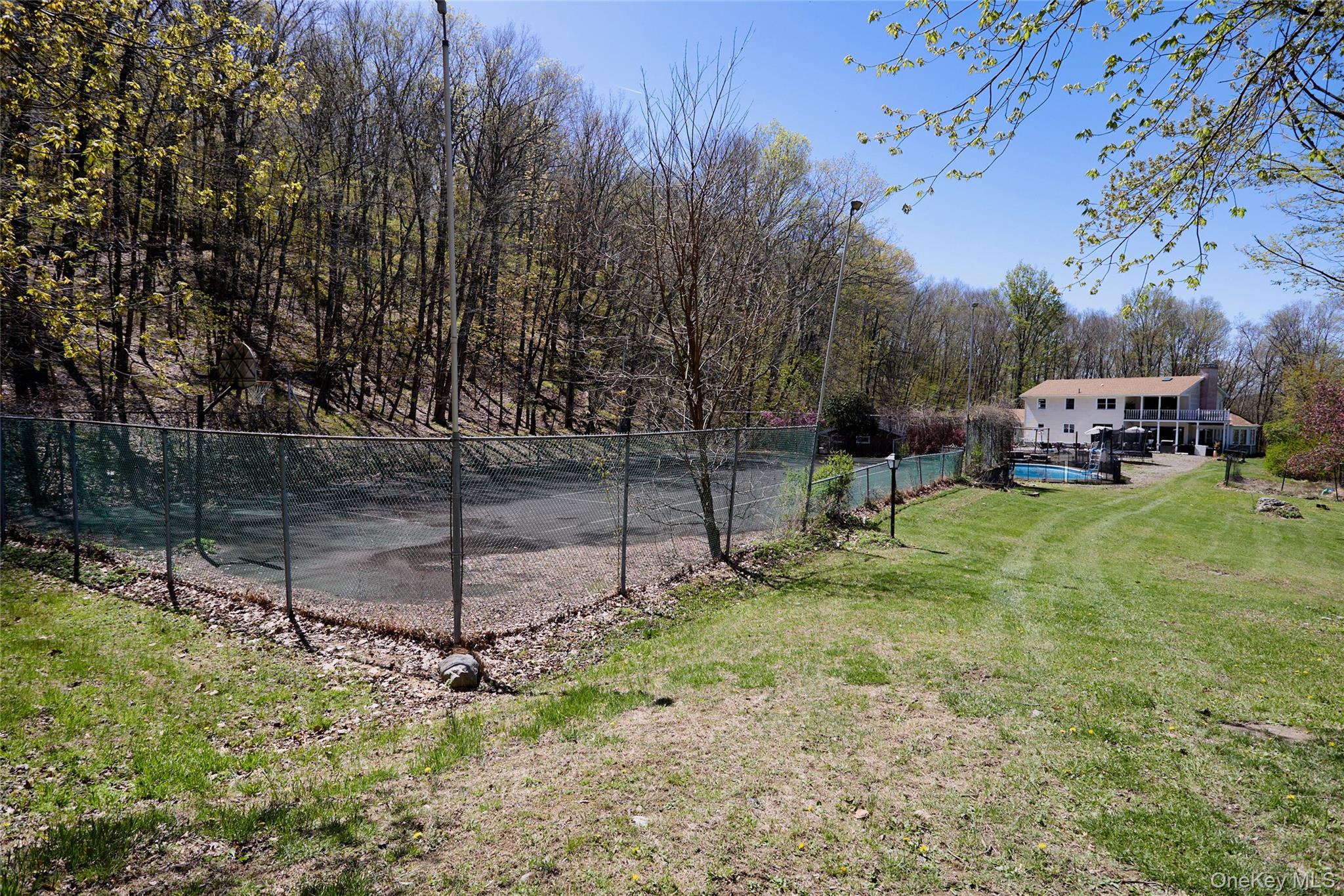 32 Cole Road Pleasant Valley, NY 12569 - Photo 4 of 49 a view of a yard with a bench