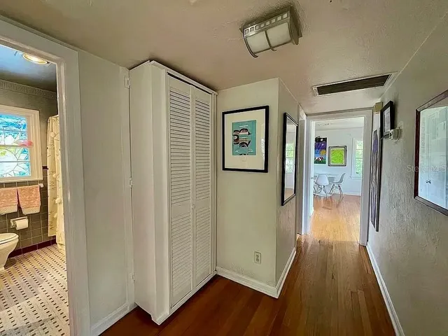 a view of entryway with wooden floor
