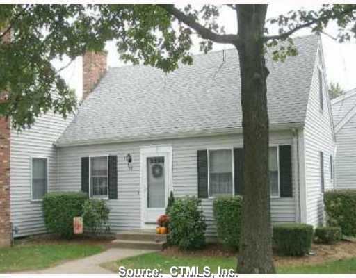 102 Wetherell Street, Unit 19 Manchester, CT 06040 - Photo 1 of 1 a view of a house with a yard