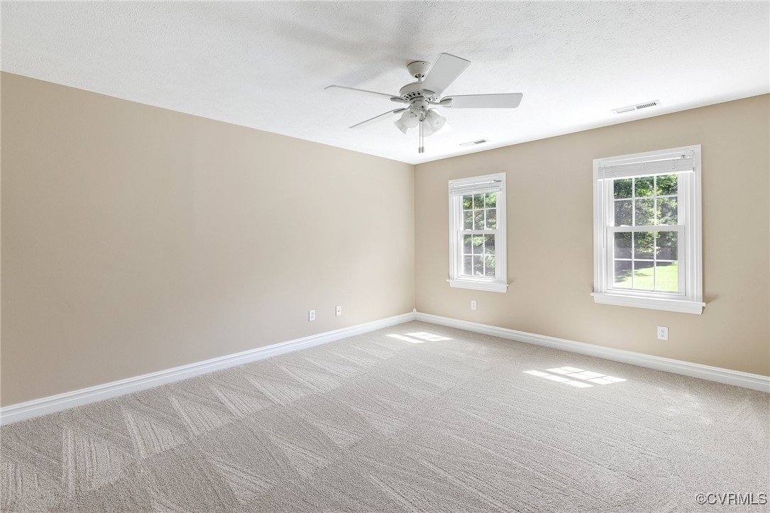 9850 Taylor Road Chesterfield, VA 23838 - Photo 16 of 38 a view of an empty room with a window