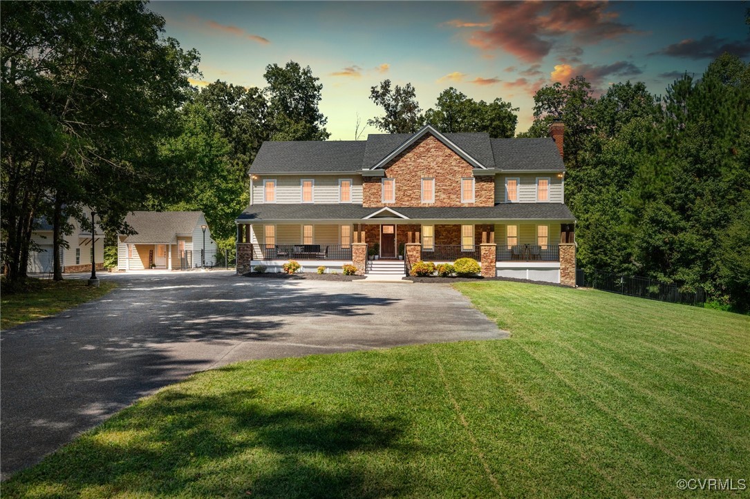 9850 Taylor Road Chesterfield, VA 23838 - Photo 2 of 38 a front view of a house with yard and green space