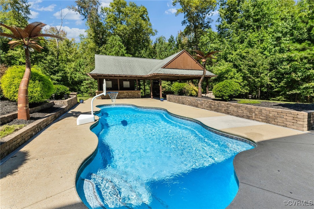 9850 Taylor Road Chesterfield, VA 23838 - Photo 25 of 38 a view of a swimming pool with a yard