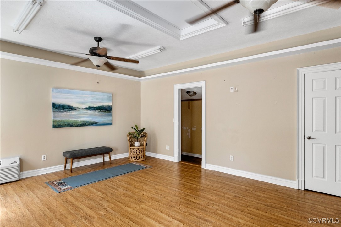 9850 Taylor Road Chesterfield, VA 23838 - Photo 28 of 38 a view of an empty room with wooden floor and a ceiling fan