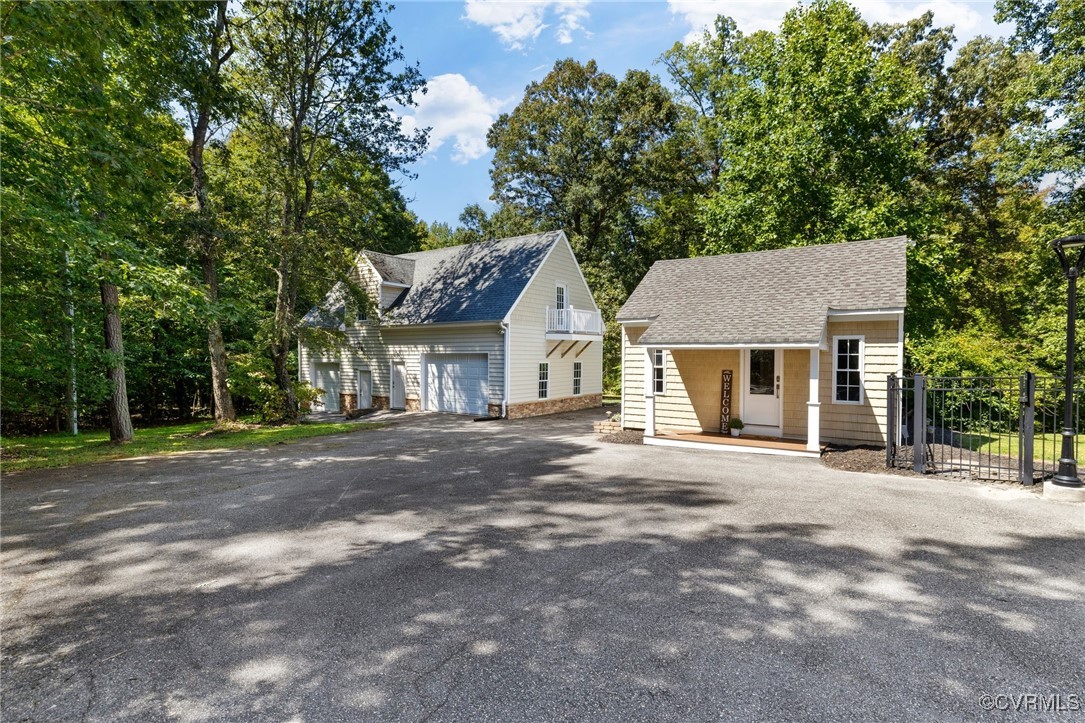 9850 Taylor Road Chesterfield, VA 23838 - Photo 32 of 38 a view of a house with a yard and large trees