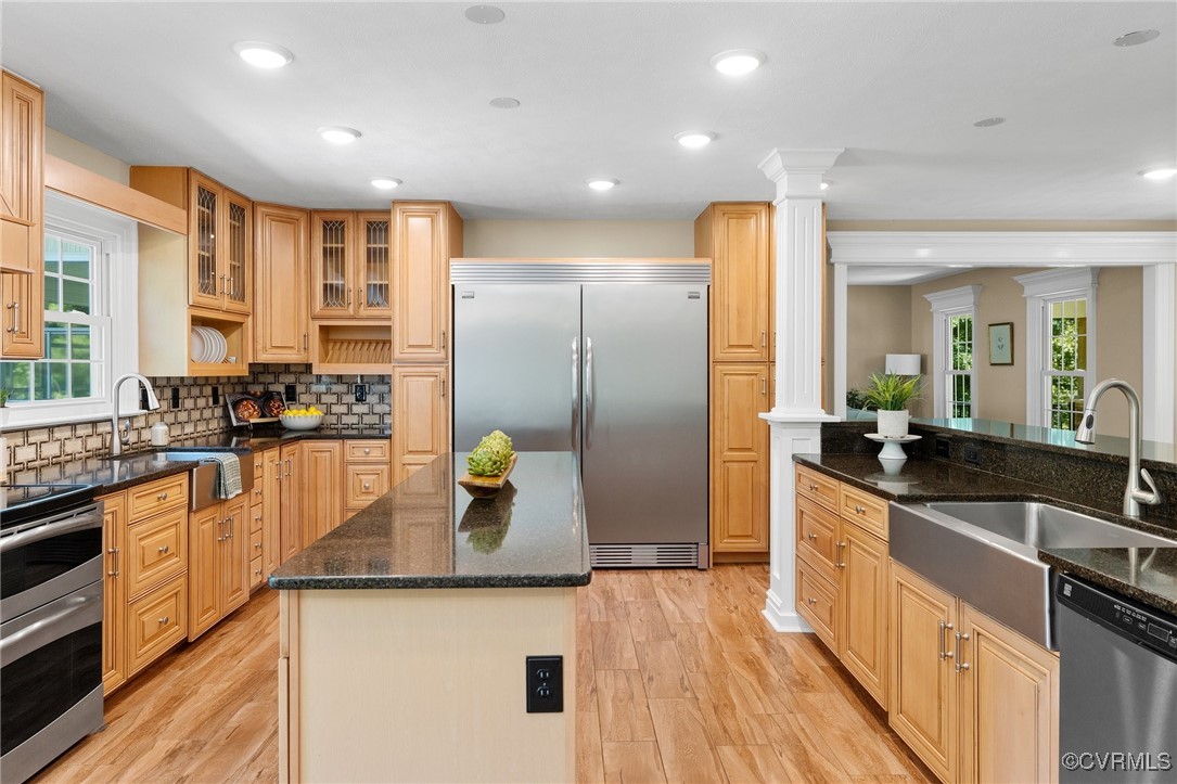 9850 Taylor Road Chesterfield, VA 23838 - Photo 8 of 38 a kitchen with stainless steel appliances granite countertop a sink a stove and a refrigerator