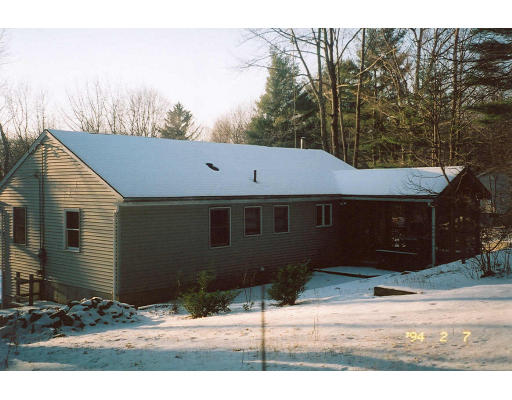 106 Clark Road Sturbridge, MA 01518 - Photo 2 of 6 a front view of a house