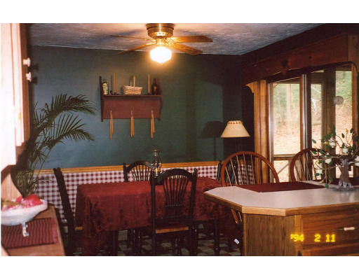 106 Clark Road Sturbridge, MA 01518 - Photo 4 of 6 a view of a patio with table and chairs