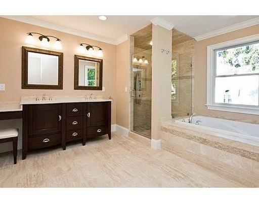 157 Dickerman Road Newton, MA 02461 - Photo 13 of 25 a spacious bathroom with a tub sink and mirror