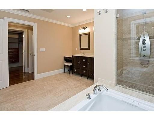 157 Dickerman Road Newton, MA 02461 - Photo 14 of 25 a bathroom with a bathtub sink and mirror