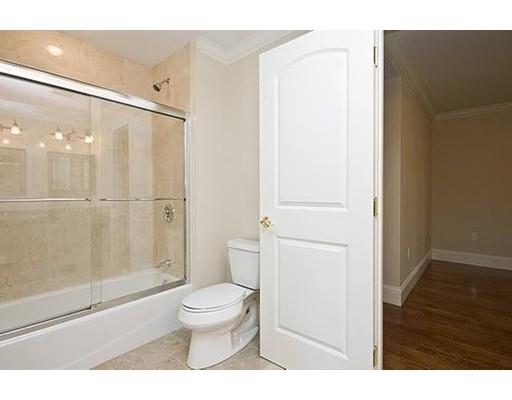 157 Dickerman Road Newton, MA 02461 - Photo 18 of 25 a bathroom with a toilet a sink and shower