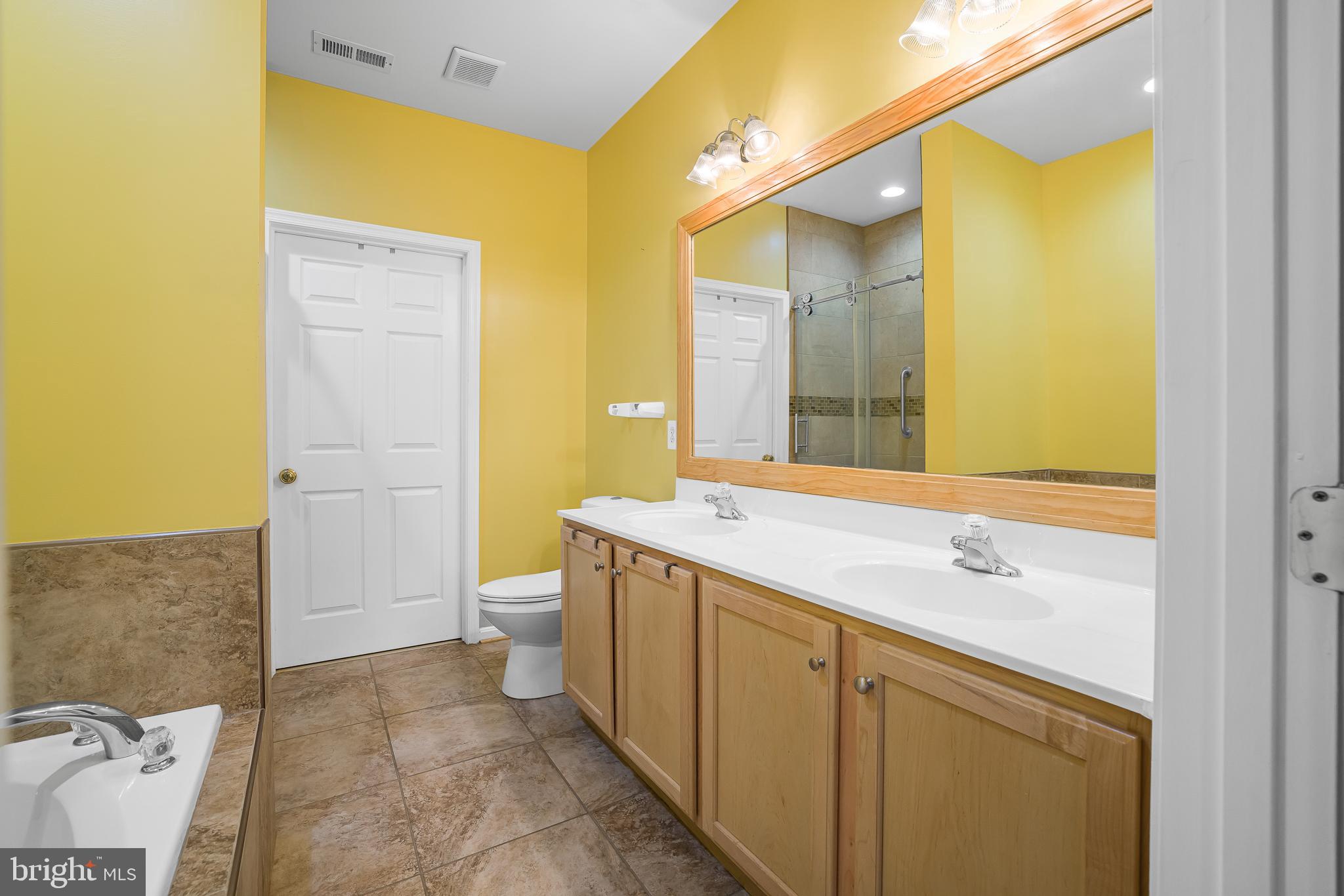 433 Pierce Run Newark, DE 19702 - Photo 16 of 43 a bathroom with a granite countertop sink toilet and shower