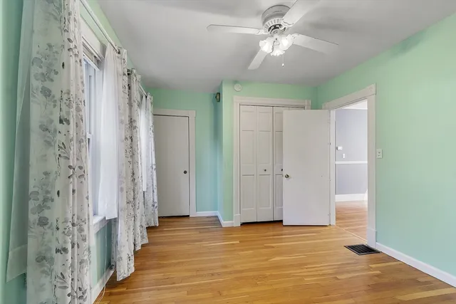 a view of a hallway view with staircase