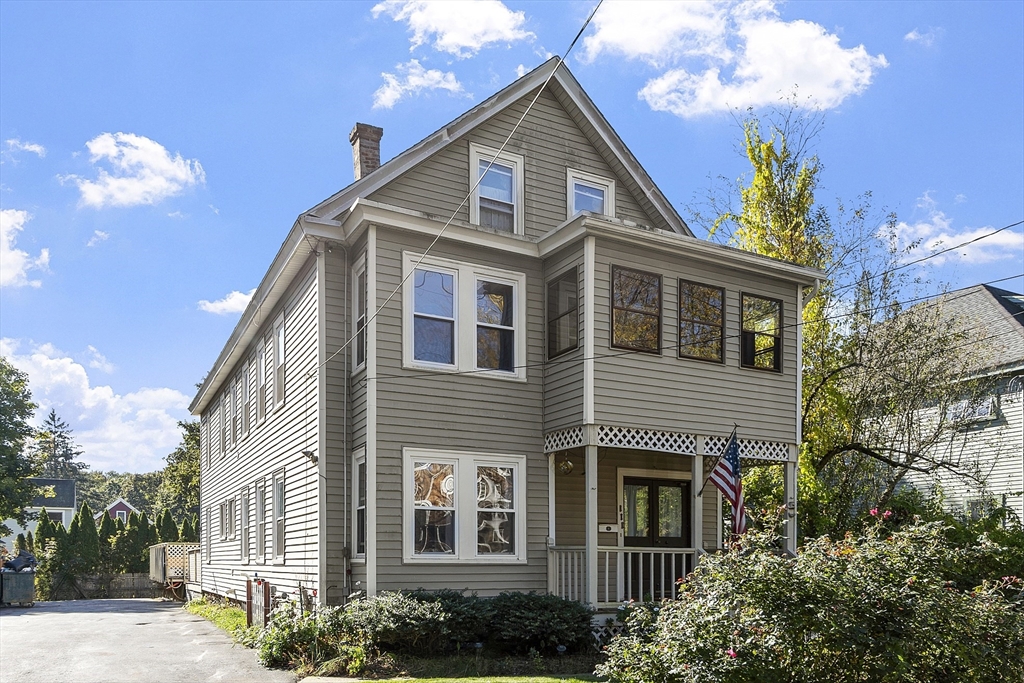 111 Central Street Concord, MA 01742 - Photo 2 of 42 a front view of a house with a yard
