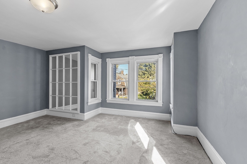 111 Central Street Concord, MA 01742 - Photo 21 of 42 an empty room with windows
