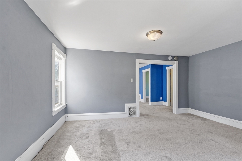 111 Central Street Concord, MA 01742 - Photo 22 of 42 a view of an empty room with window and closet area