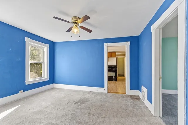 a kitchen with stainless steel appliances granite countertop a stove and a refrigerator