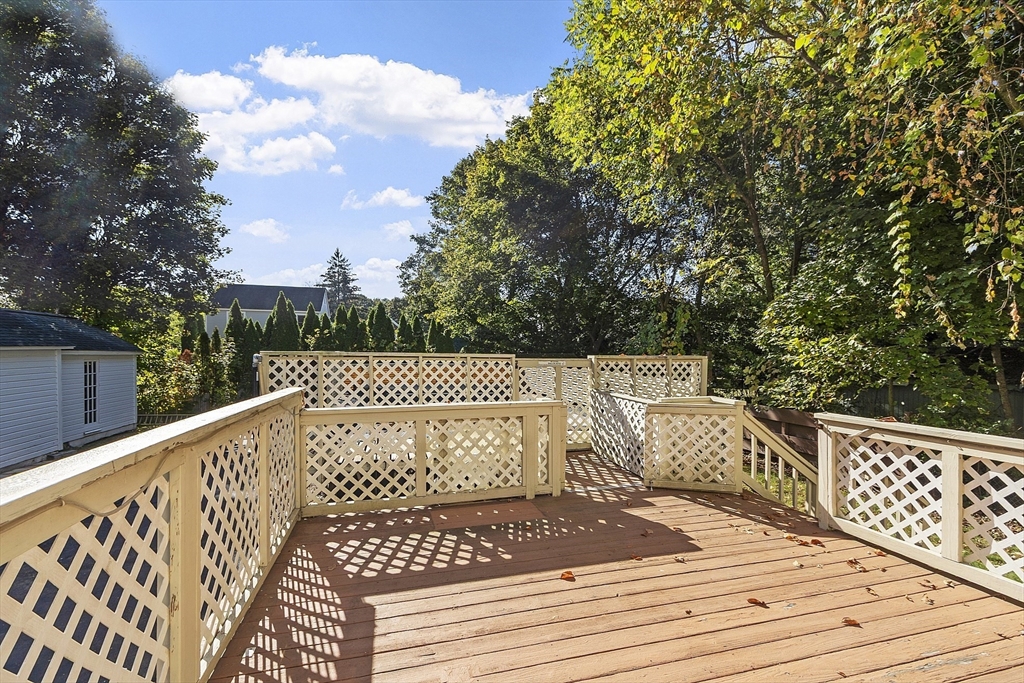 111 Central Street Concord, MA 01742 - Photo 38 of 42 a view of balcony with wooden floor and fence