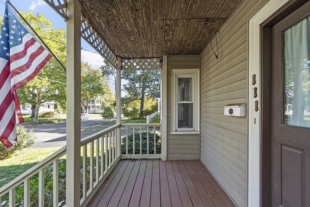 111 Central Street Concord, MA 01742 - Photo 4 of 42 a view of a balcony with wooden floor