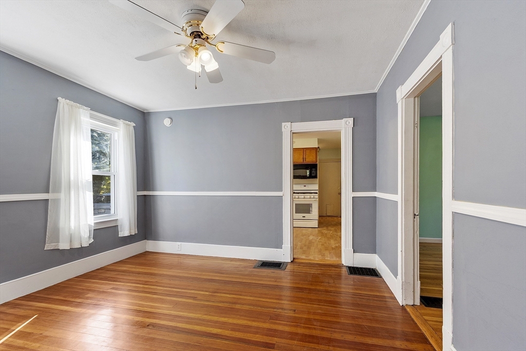 111 Central Street Concord, MA 01742 - Photo 9 of 42 wooden floor in an empty room with a window