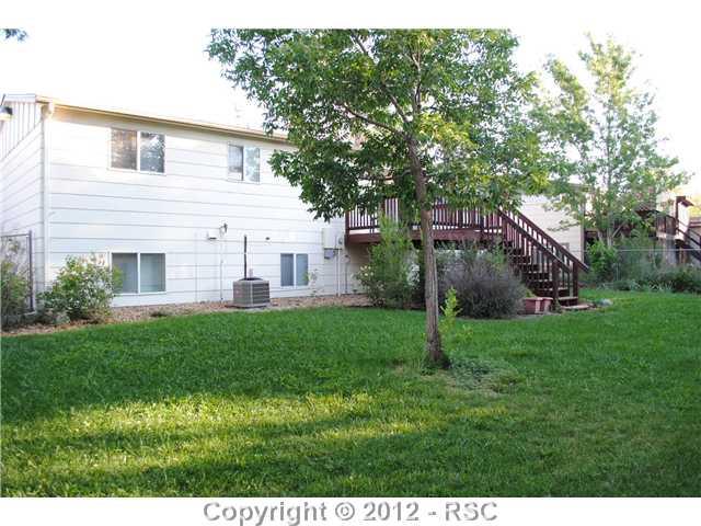 7115 Chippewa Road Colorado Springs, CO 80915 - Photo 16 of 16 Large lot with plenty of grass, huge mature trees & RV parking