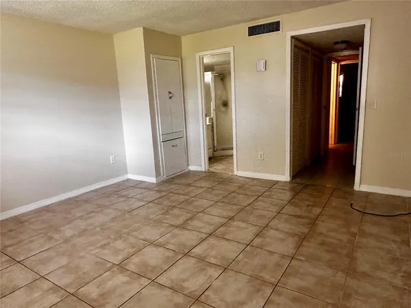 a view of a room with a bathroom