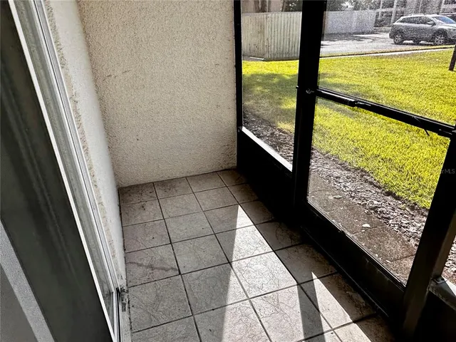 a view of a large window with an outdoor space