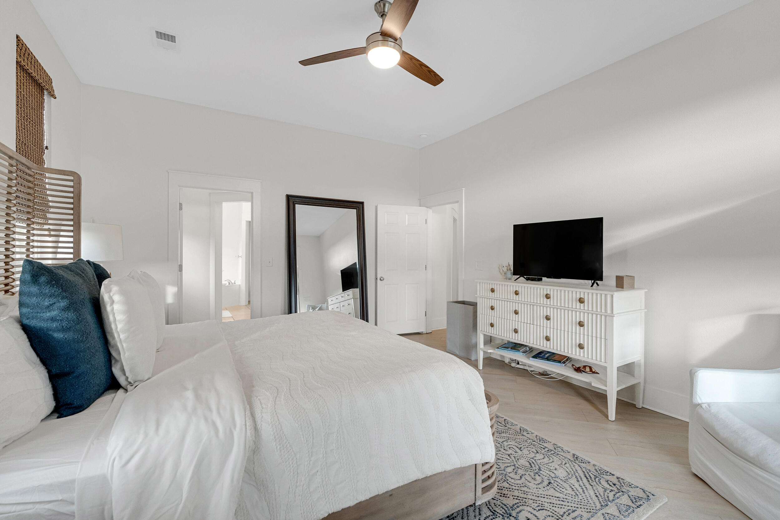61 West Cobia Run, Unit 102 Inlet Beach, FL 32461 - Photo 14 of 37 a bedroom with a bed and a flat screen tv