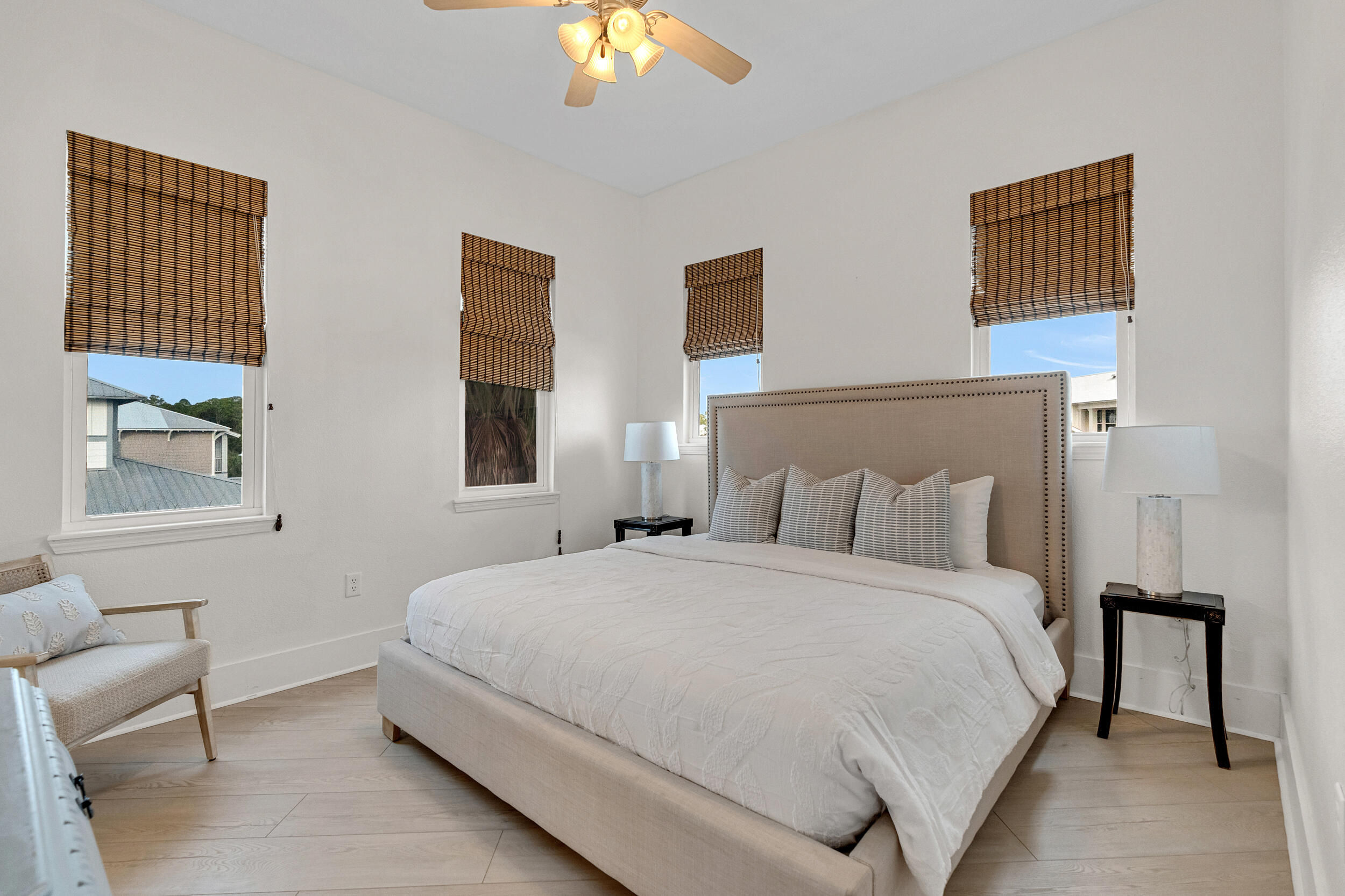 61 West Cobia Run, Unit 102 Inlet Beach, FL 32461 - Photo 17 of 37 a bedroom with a bed and a chandelier