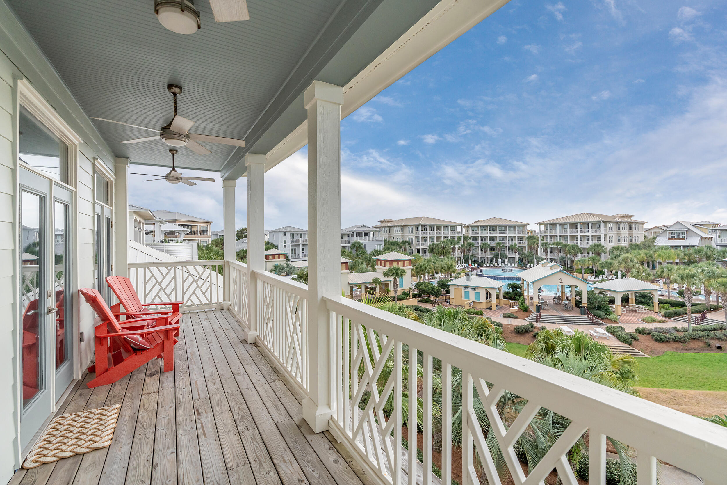 61 West Cobia Run, Unit 102 Inlet Beach, FL 32461 - Photo 2 of 37 a view of a city from a balcony with furniture