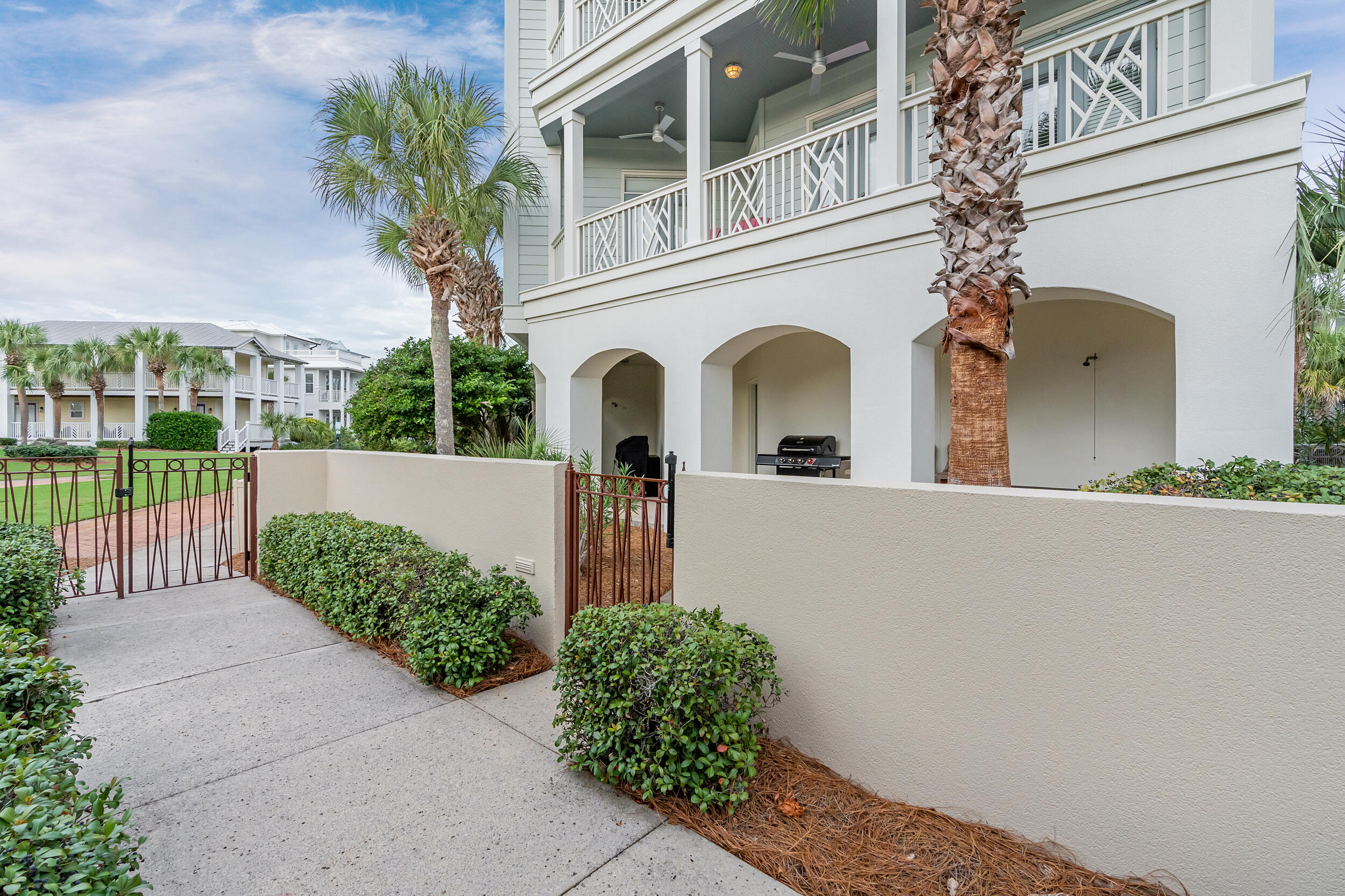 61 West Cobia Run, Unit 102 Inlet Beach, FL 32461 - Photo 28 of 37 a front view of a house with garden