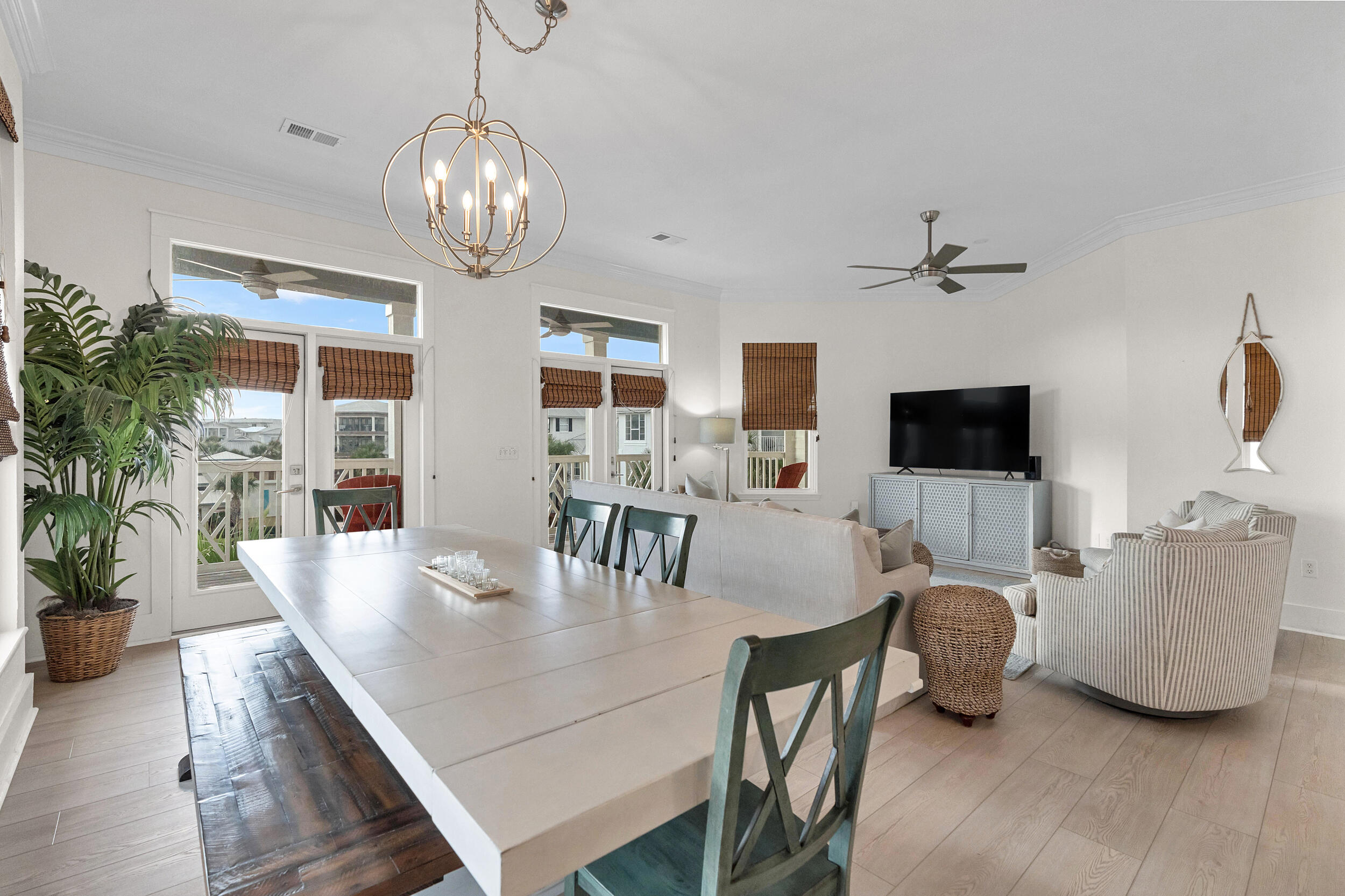 61 West Cobia Run, Unit 102 Inlet Beach, FL 32461 - Photo 3 of 37 a living room with furniture and a flat screen tv
