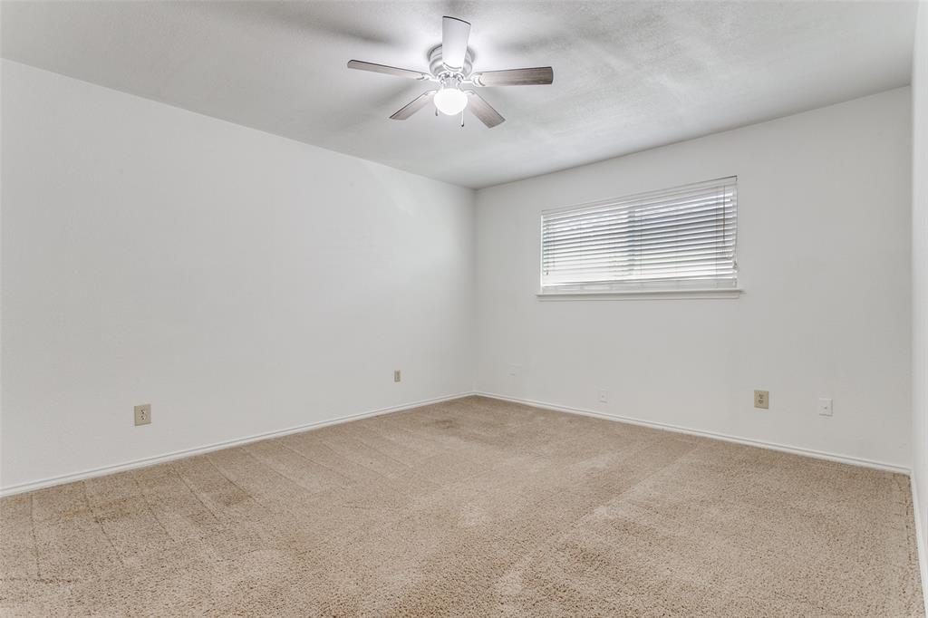 2121 Stone Moss Lane Grapevine, TX 76051 - Photo 8 of 12 Downstairs primary bedroom with attached bathroom