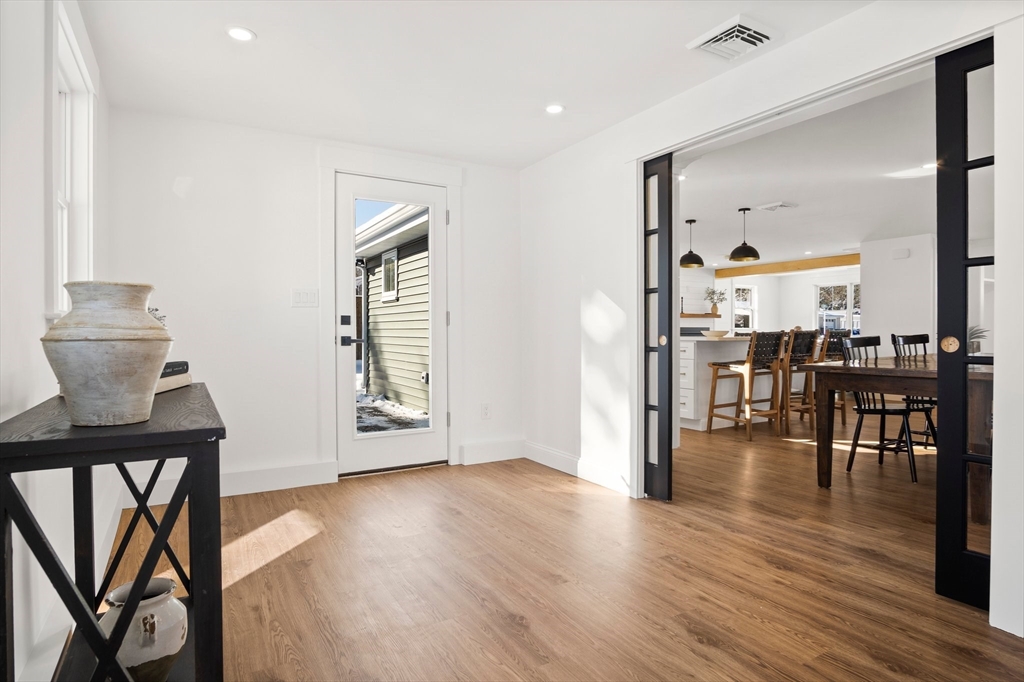 4 Jethro Street Maynard, MA 01754 - Photo 13 of 29 a view of livingroom with furniture and wooden floor