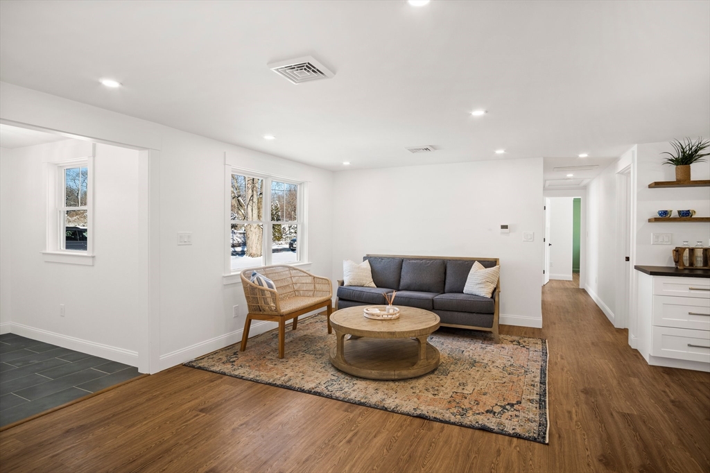 4 Jethro Street Maynard, MA 01754 - Photo 16 of 29 a living room with furniture and a wooden floor