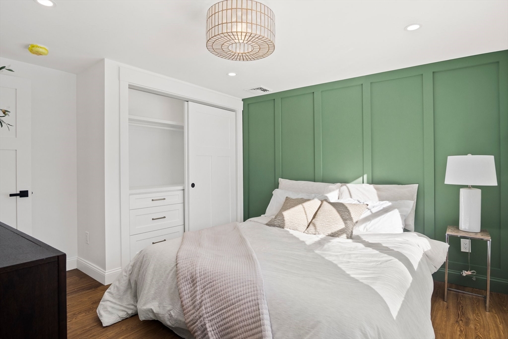 4 Jethro Street Maynard, MA 01754 - Photo 19 of 29 a bedroom with a bed and a dresser