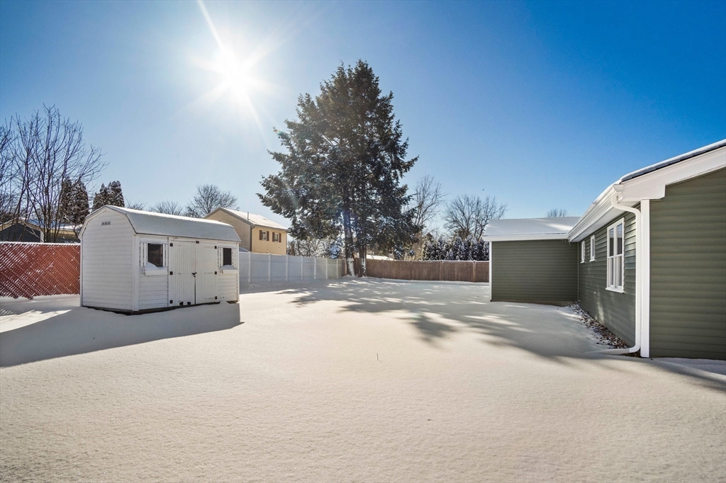 4 Jethro Street Maynard, MA 01754 - Photo 27 of 29 a view of a house with a yard