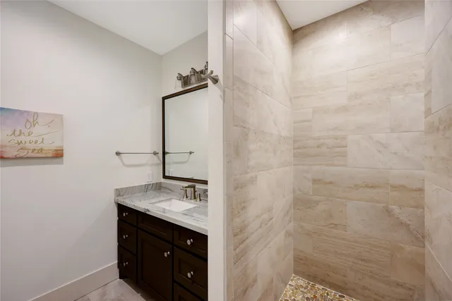 a view of a kitchen with a sink and dishwasher