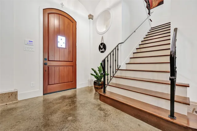 a view of entryway with wooden floor