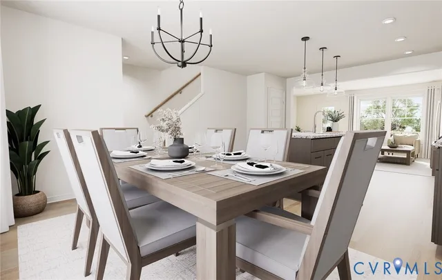 a view of a dining hall with furniture and wooden floor