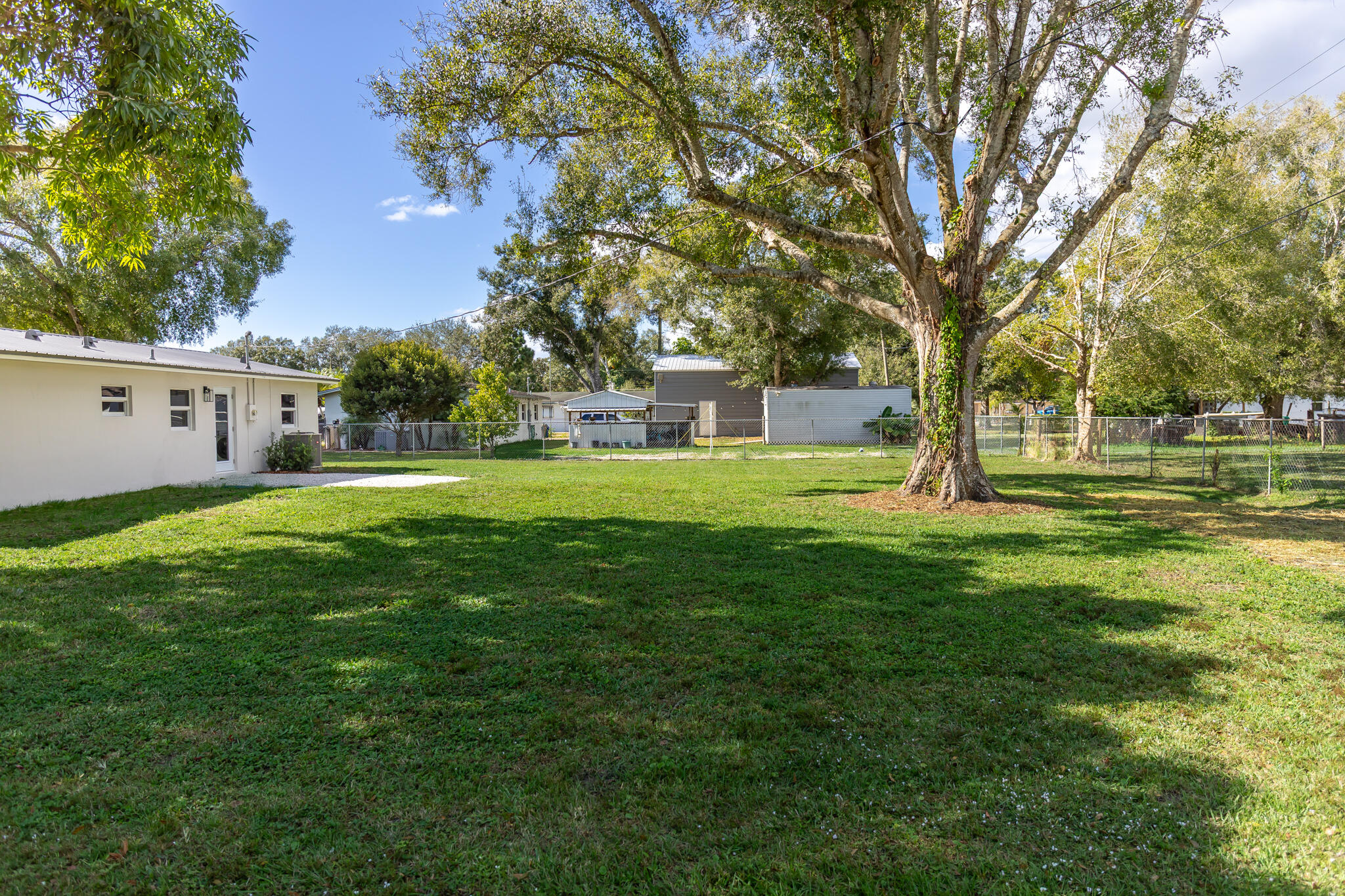 1008 Southwest 10th Street Okeechobee, FL 34974 - Photo 21 of 41 a view of a park with large trees