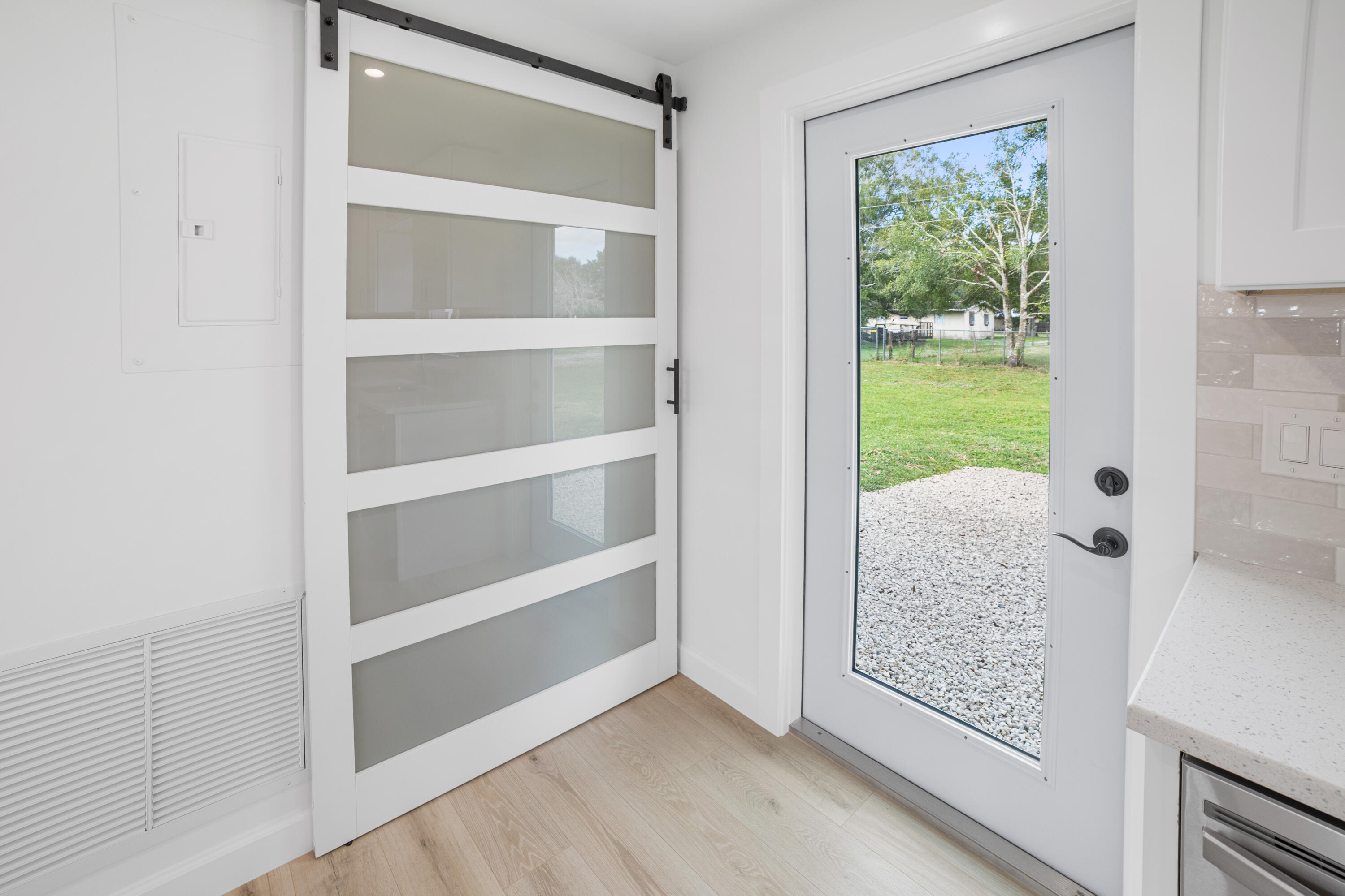 1008 Southwest 10th Street Okeechobee, FL 34974 - Photo 9 of 41 a view of an empty room with a window