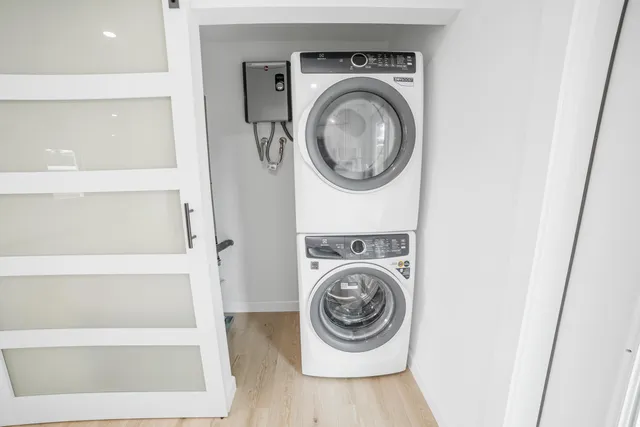 a view of washer and dryer in a utility room