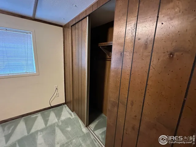 a view of a room with a sink and a window