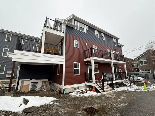 a view of a building with sitting area