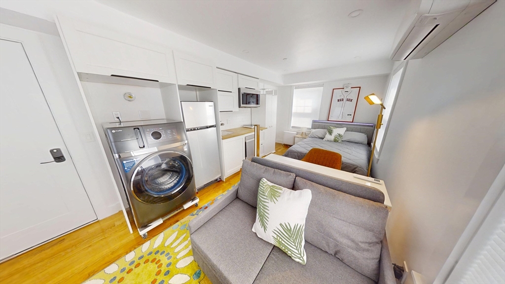 36 Shepard Street, Unit 2 Boston, MA 02135 - Photo 3 of 29 a utility room with dryer and washer